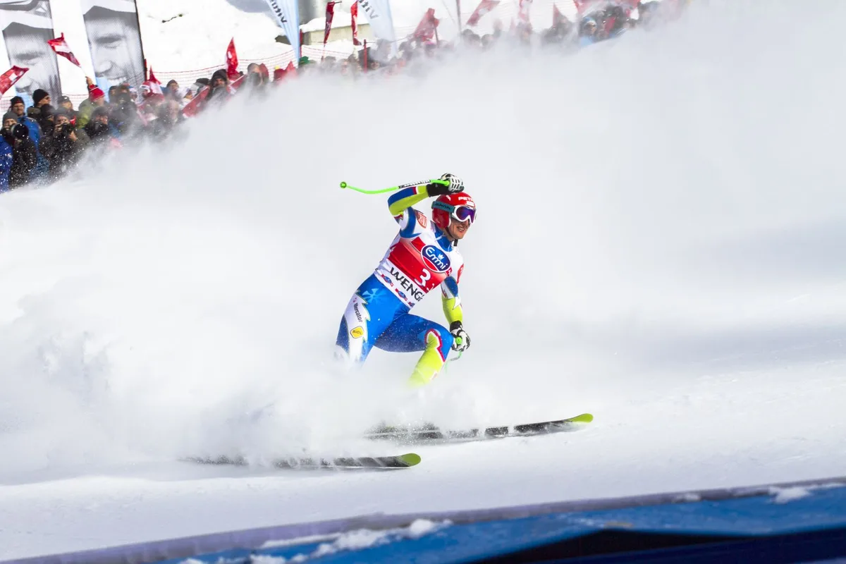 Skier racing down a snowy slope (representative image)